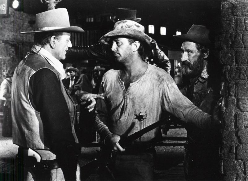 John Wayne, Robert Mitchum, and Arthur Hunnicutt