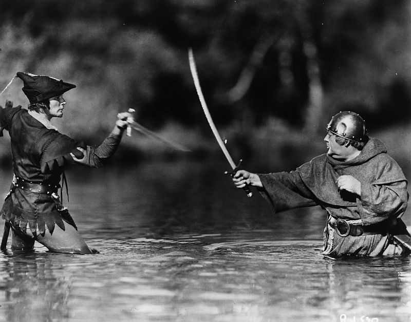 Errol Flynn and Eugene Pallette in The Adventures of Robin Hood