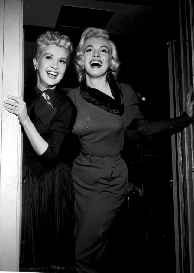 Marilyn Monroe and Betty Grable on the set of How to Marry a Millionaire 
